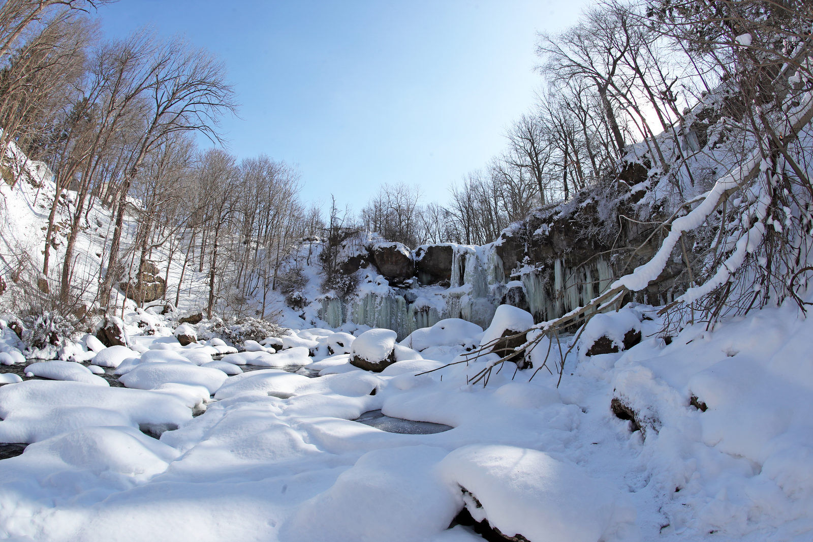 Ice forms on the the 40-foot waterfall on Murder Creek in Akron Falls Park